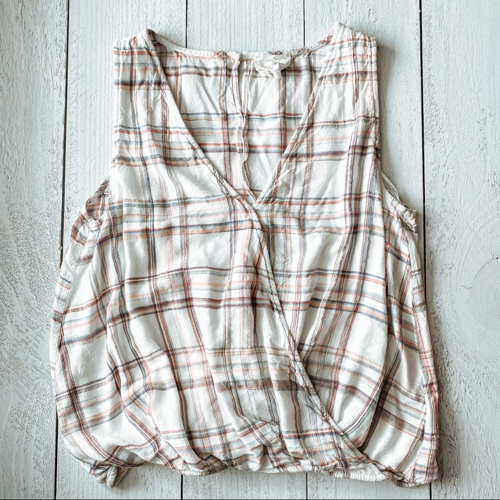 Criss- cross tank women’s shirt
